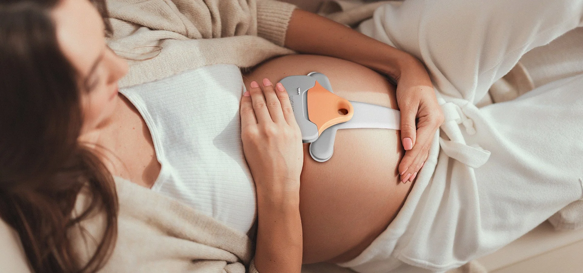 ECG patch worn on a pregnant belly